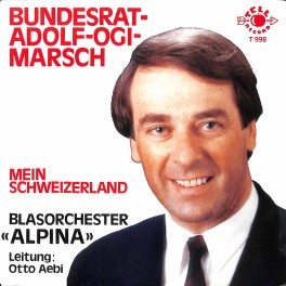 Single Vinyl: Blasorchester Alpina - Bundesrat-Adolf-Ogi-Marsch + Mein Schweizerland